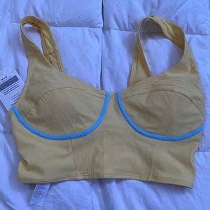 MADELAINE PETSCH X FABLETICS top